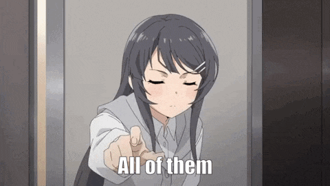 a girl is pointing at the camera with her finger and saying `` all of them '' .