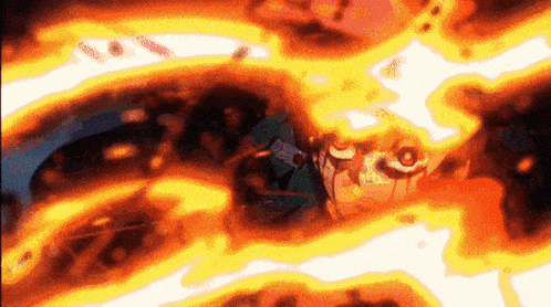 a close up of a person 's face surrounded by fire .