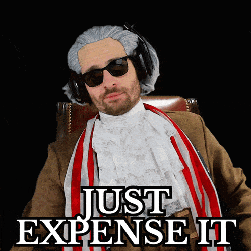 a man wearing a wig and sunglasses is sitting in a chair with the words just expense it above him