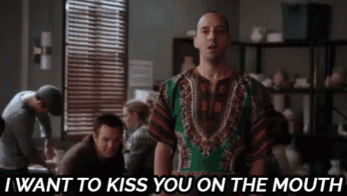 a man in a green shirt says i want to kiss you on the mouth