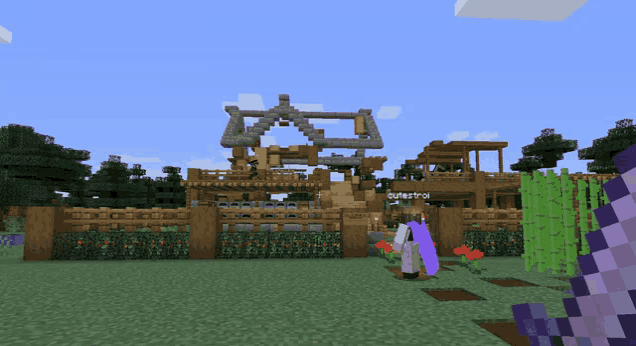 a person standing in front of a house in a video game