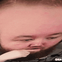 a close up of a man 's face with giga written in the corner