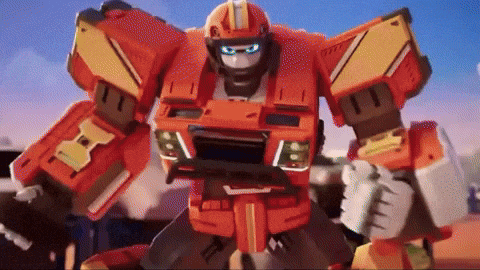 a red robot with a yellow stripe on the helmet is standing in front of a blue sky