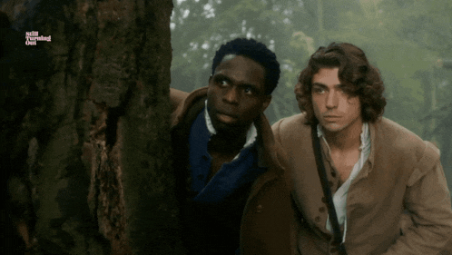 two men peeking out from behind a tree with the words hello something cool on the bottom