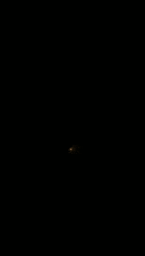 a glowing light in the middle of a circle on a dark background