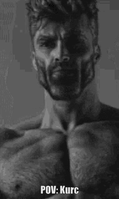a man with a beard is flexing his muscles in a black and white photo with the caption pov : kurc .
