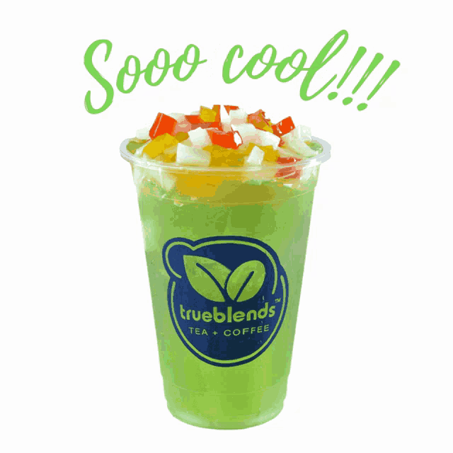 a trueblends tea and coffee cup with a green liquid in it