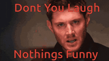 a poster with a man and the words " dont you laugh nothings funny " on it