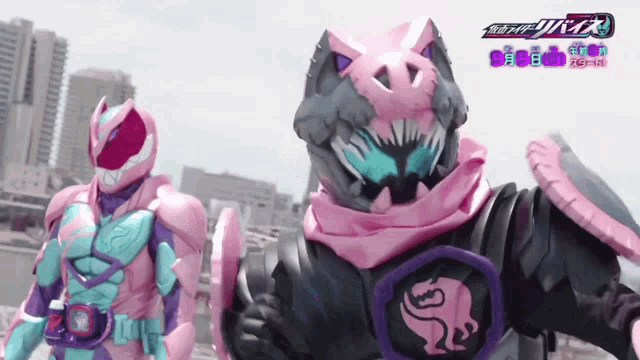 two masked riders are standing next to each other in a city scene