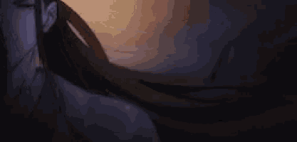 a close up of a person 's face with a sword in the background