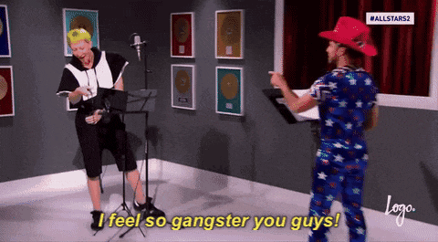 a man says " i feel so gangster you guys " in front of a microphone