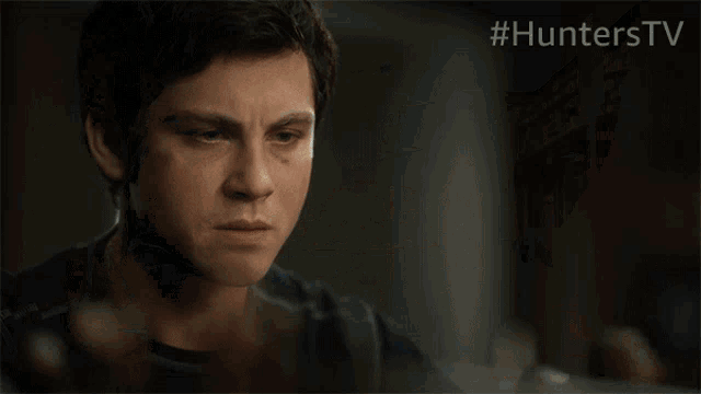 a blurry picture of a man with #hunterstv written on the bottom right