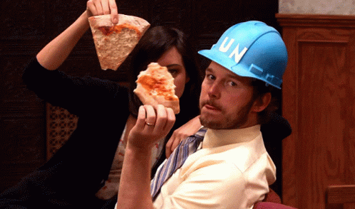 Parks And Rec Andy And April GIF - Parks And Rec Andy And April Pizza GIFs