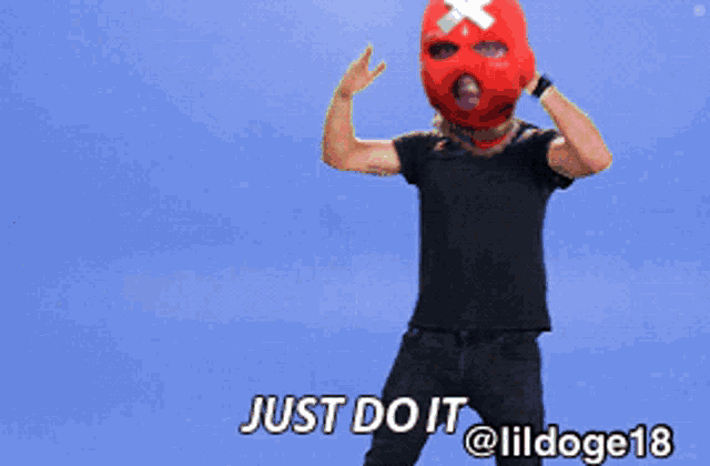 a man wearing a red ski mask and a black shirt says just do it @ lildoge18