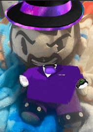 a stuffed toy with a beard wearing a purple hat