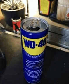 a can of wd-40 sits on a countertop