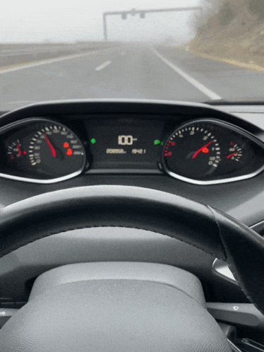 the dashboard of a car shows that the speed is 100 mph