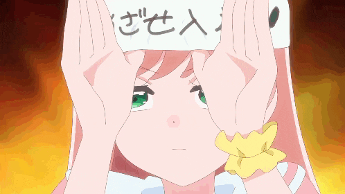 a girl with pink hair is wearing a white hat with chinese writing on it and covering her face with her hands