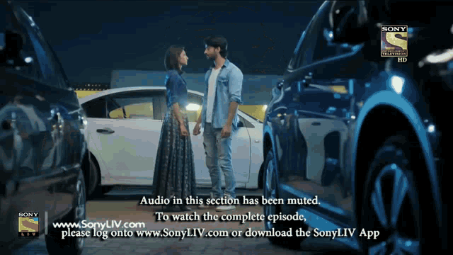 an advertisement for sony television shows a man and a woman standing next to each other