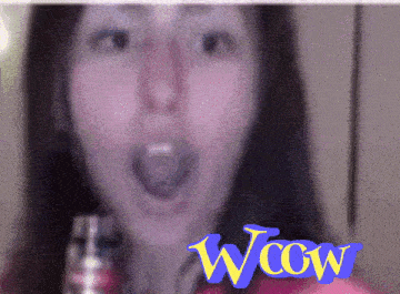 a close up of a woman 's face with the word wow on the bottom right