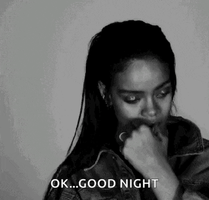 a black and white photo of a woman giving a good night greeting .