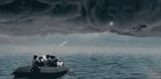 a group of people in a raft in the ocean