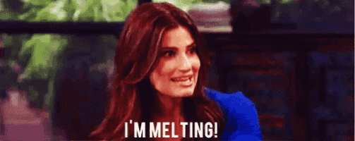a woman with red hair is smiling and says `` i 'm melting '' .