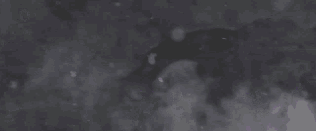 the letters mhbzb are glowing in the dark