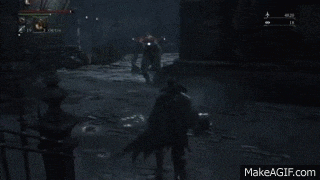 a person is standing in a dark room with a fireball coming out of their chest .
