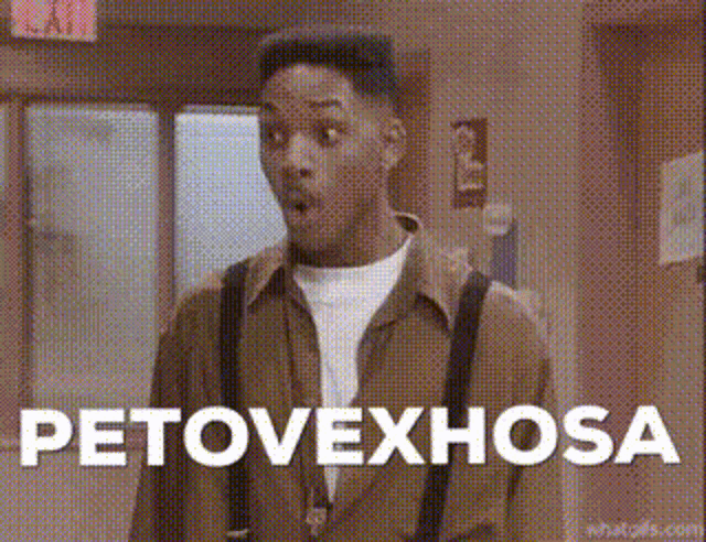 a man with a surprised look on his face is standing in a hallway with the words petovexhosa written in white