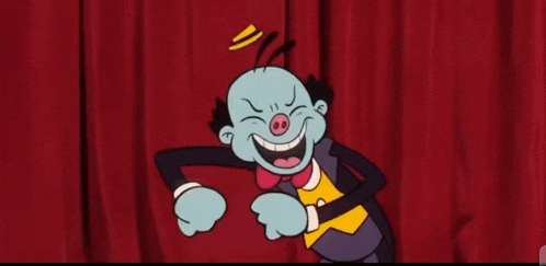 a cartoon character with a pig nose is smiling on a stage