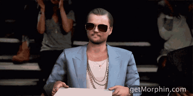 a man wearing sunglasses holds a piece of paper with the website getmorphin.com below him