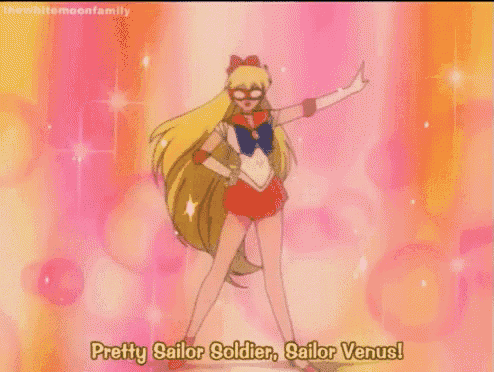 a pretty sailor soldier , sailor venus ! is dancing in a pink background .