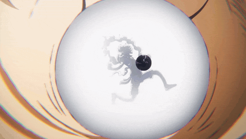 a silhouette of a person holding a black ball in their hand