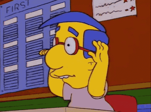 a yellow cartoon character is talking on a cell phone