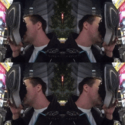 a man is licking another man 's shoe in a mirror image