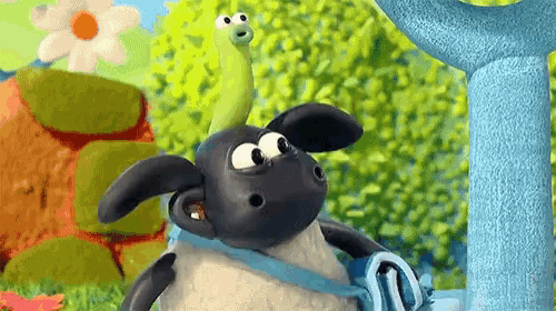 a cartoon sheep with a worm on its head .