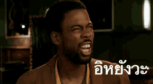 a man with a beard is making a funny face with a caption that says ' angry ' on it