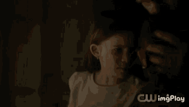 a blurry picture of a person 's arm with the words cw imgplay in the corner