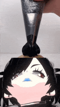 a person is holding a pastry bag that says ' w ' on it