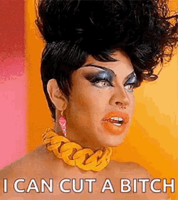 a drag queen is wearing a yellow chain around her neck and earrings and says `` i can cut a bitch '' .