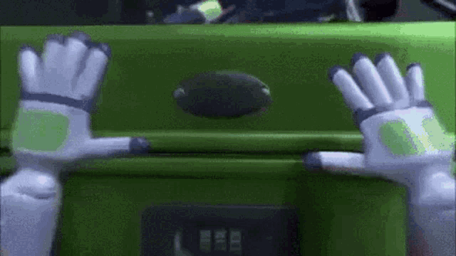 a close up of a toy story character 's hands