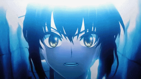 a close up of a girl 's face with a blue light behind her