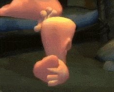 a close up of a person 's foot with a yellow toe and a pink toe .