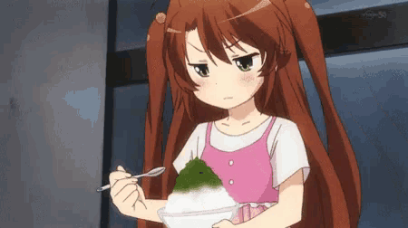 a girl in a pink dress is eating a bowl of food with a spoon