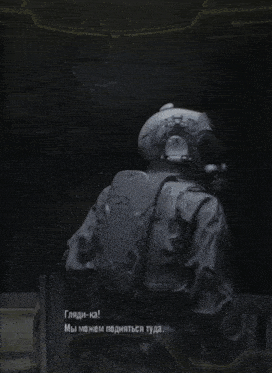 a man in a gas mask is holding a gun and talking in a foreign language