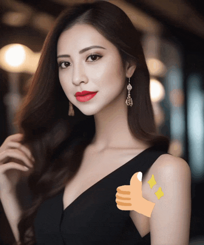 a woman in a black dress with red lipstick and a thumbs up