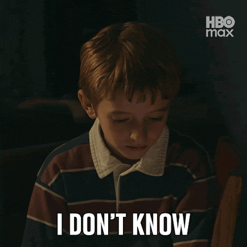 a young boy in a striped shirt says i don t know