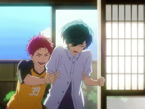a boy with red hair is wearing a number 39 jersey