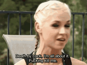 a woman is sitting on a chair and saying death by cock i 'm all about it fucking kill me